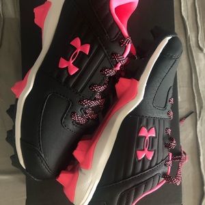 Pink and black cleats